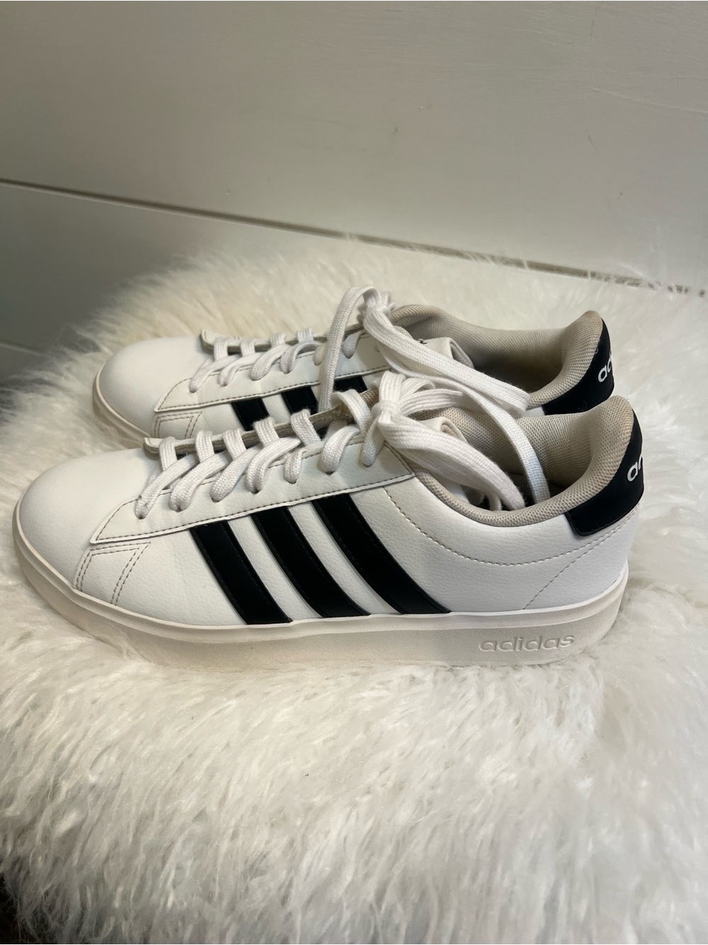 adidas White Sneakers with Black Three-Stripes Accent